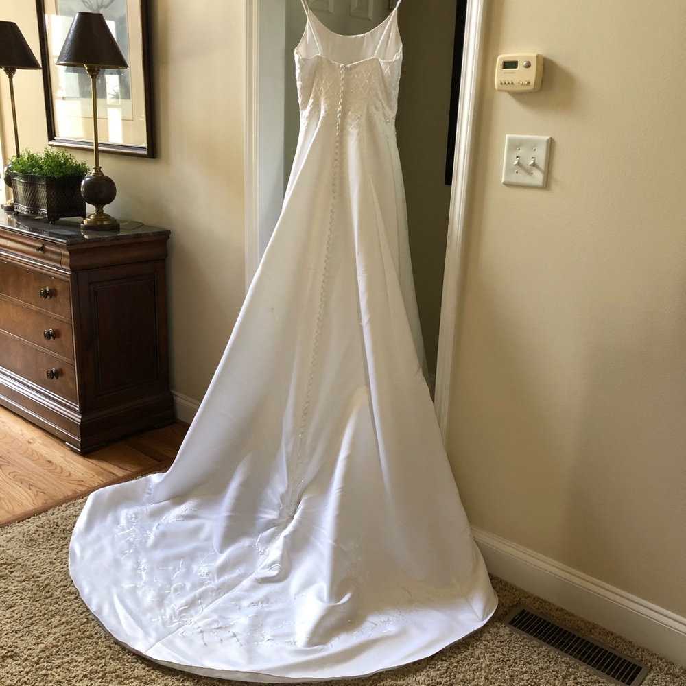 Michaelangelo wedding gown by David’s Bridal.  Sz8